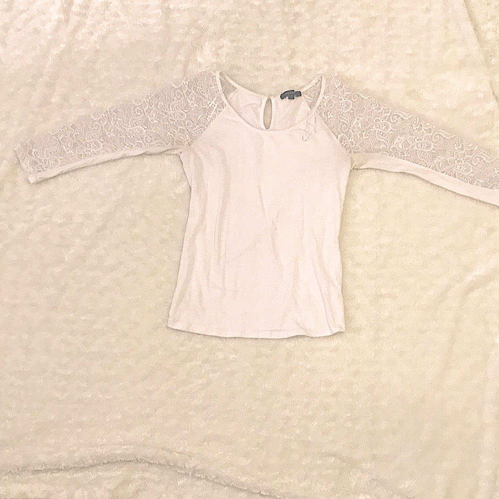 White long sleeve shirt with lace arms.